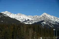 29A Mystic Peak And Mount Ishbel With Moon Afternoon From Trans Canada Highway Driving Between Banff And Lake Louise in Winter